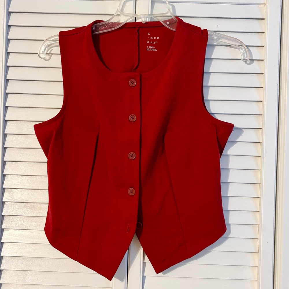 Red button down vest